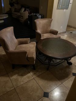 Ashley Rafferty Coffee Table and Wingback Accent Chairs