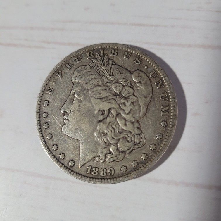 1889-O MORGAN SILVER DOLLAR COIN-CIR