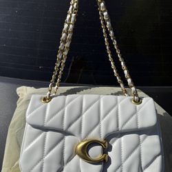 white quilted coach bag