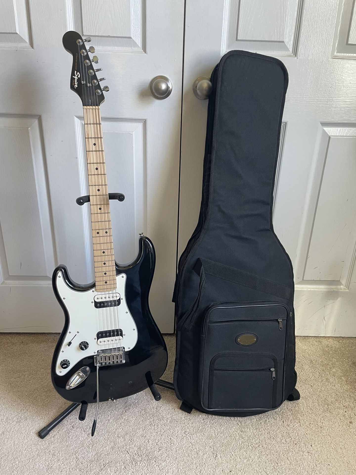 Left Handed Fender Squier Contemporary Stratocaster guitar with gig bag