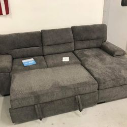 Grey sleeper sectional with storage chaise - Ashley 