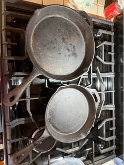 Two cast iron skillets 12” & 10”