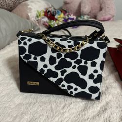 Black cow print purse