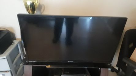 40" Emerson trying to get a bigger and a Nice TV stand$50 both $180....