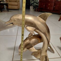 A PAIR BRASS DOPHINS 