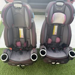 2 Car Seats - Gray and Pink