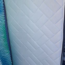 2 Identical Twin Mattresses, Both with Foam Mattress Toppers, Mattress Protectors and Box Springs