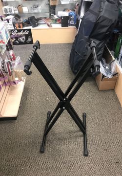 ADJUSTABLE KEYBOARD STAND.