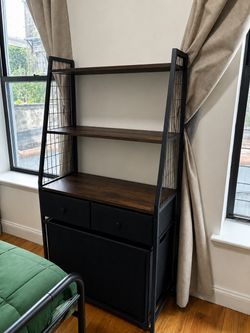 Shelf with laundry basket