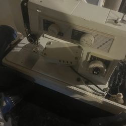 2 Vintage Foot Pedal Sewing Machines 