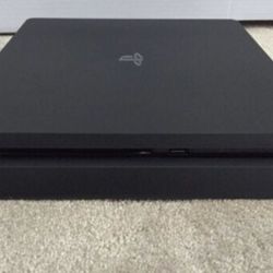Sony PS4 Slim 500GB + 2 Controllers + 6 Games + Dual Controller Charging Dock
