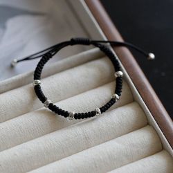 Koi transshipment good luck bracelet on the shore red rope