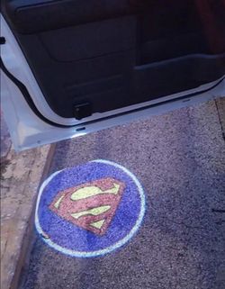 2 Superman UNIVERSAL WIRELESS car DOOR projector LIGHTS attach with 3M. SHIPPING AVAILABLE