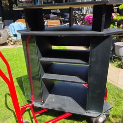 Corner TV Stand in black with glass doors and media shelves
39"w x 24"d x 39"h