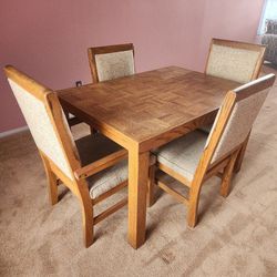 Solid oak  vintage six piece dining room set with 4 chairs and hutch.