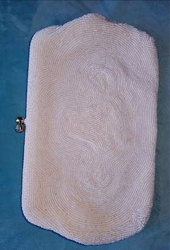Vintage Magid White Seed Beaded Evening Handbag .Made in Japan 
Great condition 
Super clean inside and out 
Please see all pictures for details