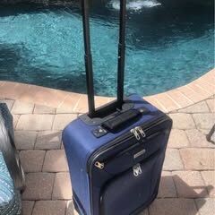 Blue American Tourister Carry On Suitcase