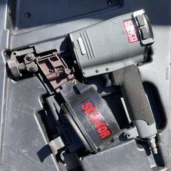 Pneumatic roofing nailer