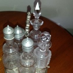 Antique 6 Caster Cut Glass Decanters with Metal Lids And Glass Stopper On Carousel 