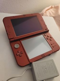 NEW NINTENDO 3DSXL HAS ALOT OF GAMES ALREADY 128GB + CHARGER