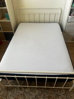 White full sized bed frame and mattress