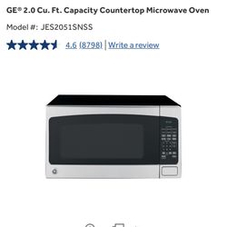 NEW GE COUNTER TOP 24”MICROWAVE STILL IN BOX. NEW NEVER USED 