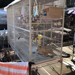 Parakeet cage with everything