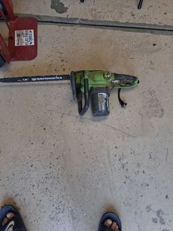 Eighteen inch green works chainsaw electric