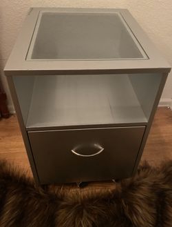 Silver Metal Cabinet With Rollers