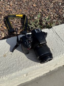 Nikon D3400 DSLR Camera Bundle – 2 Lenses + Tripod + SD Card
