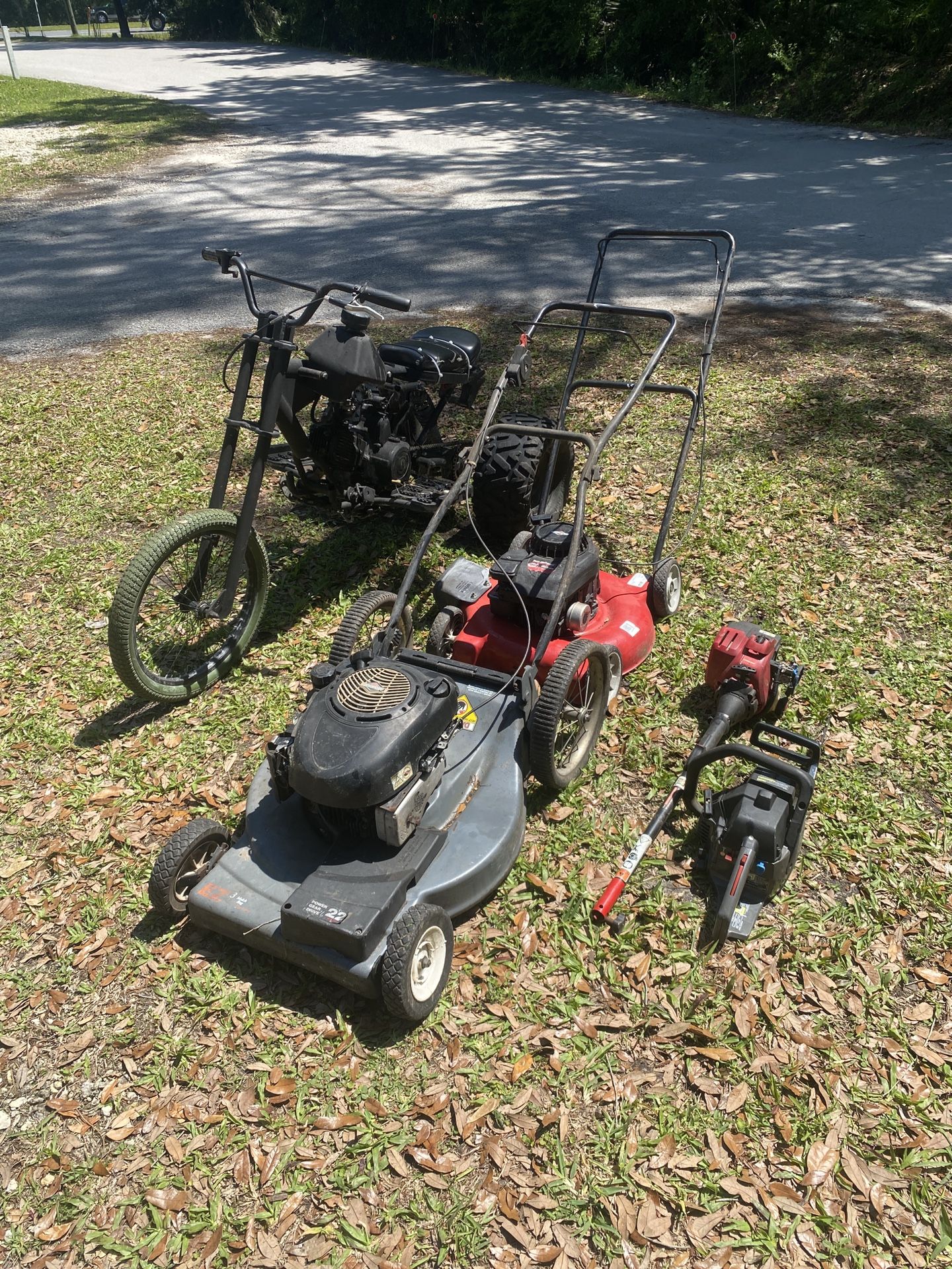 (Three Wheeler Sold) Parts Or Repair - 2 Lawn Mowers, Weed Eater, And Chainsaw