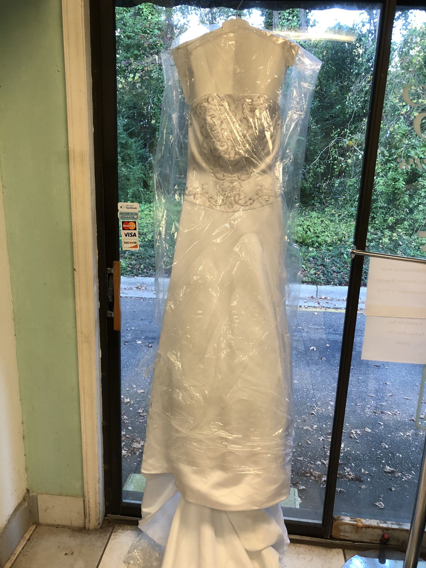 Used wedding dress and women’s dress both medium size