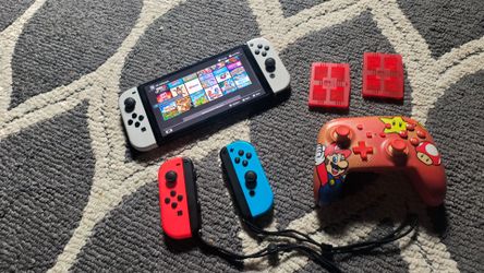 Switch OLED +Extra Controllers and Physical Games
