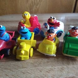 Vintage Sesame Street Figures In Vehicles. (6)