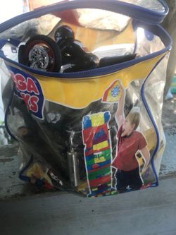 Bag of boys cars and trucks, ect