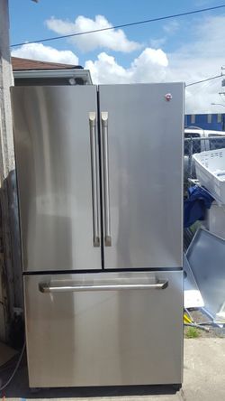 refrigerator brand GE measures 36 in width and 70 in height 2 months warranty delivery and installation