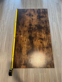 Coffee table with metal shelf