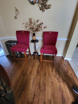 2 red plush velvet dining chairs