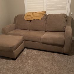 couch, fold out bed (mattress included), and ottomon 