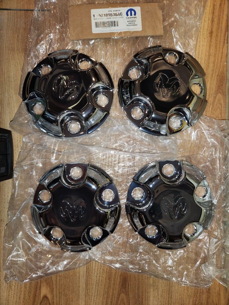 4 Brand New - Mopar '02-'14 Dodge stock wheel Center Trim