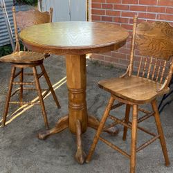 Pub Table With Swivel Chairs