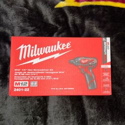 Milwaukee M2 quarter inch hex screwdriver kit with charger and two batteries