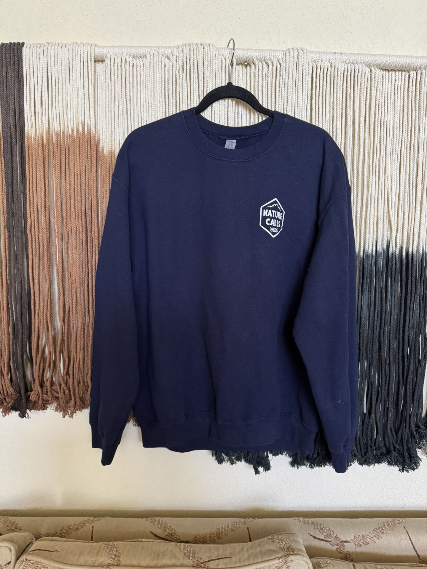 Navy blue crewneck sweatshirt with "Keepin' It Reel" graphic; perfect condition 