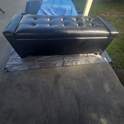 BLACK FAUX LEATHER STORAGE OTTOMAN