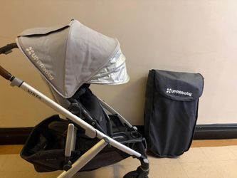 Uppababy V2 Complete Set with Carrycot, which includes a stroller, carrycot, rain cover, and footmuff, is the ideal stroller for growing families: rea