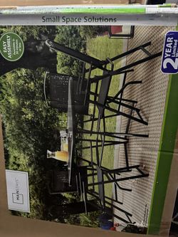 Brand New 5 Piece Outdoor Table And Chairs