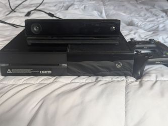 Xbox One gaming console comes with a Kinect sensor and two wireless controllers