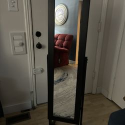 Standing Mirror And Jewelry Armoires 