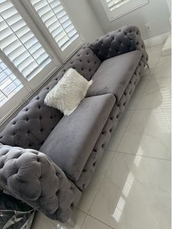 3 grey tufted sofa