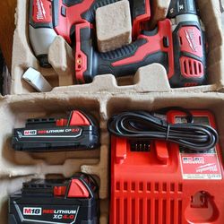 M18 milwaukee combo kit drill driver/lmpact driver 2 battery And Charger New